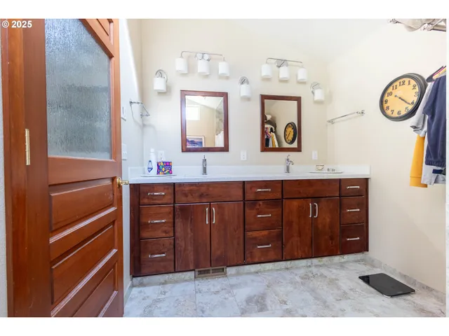 a view of a living room with wooden floor
