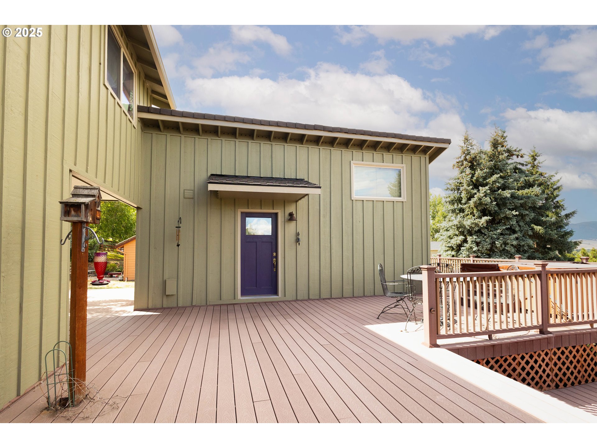 1902 Highland Drive La Grande, OR 97850 - Photo 10 of 46 a view of a house with a wooden deck