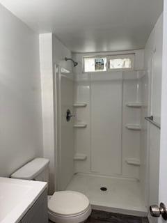 681 South Market Road Earlimart, CA 93219 - Photo 9 of 13 a bathroom with a shower and a toilet
