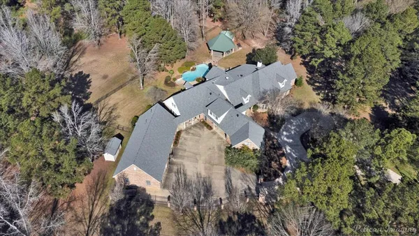 an aerial view of residential house with outdoor space