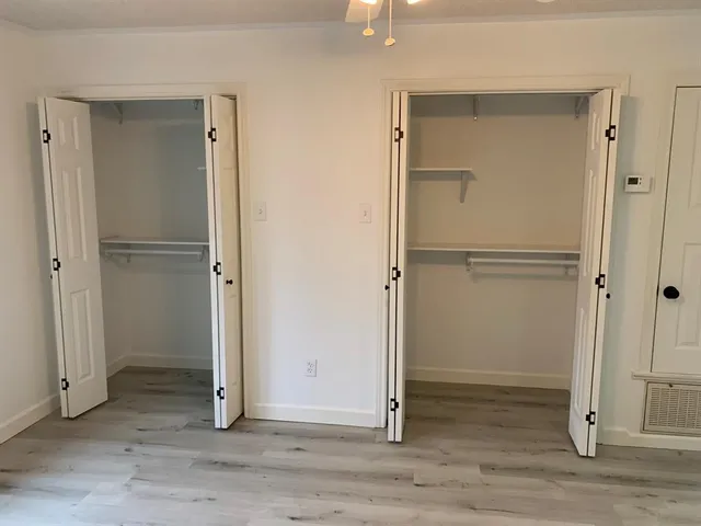 wooden floor and white doors