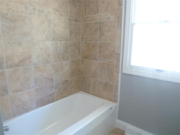 201 Walnut Plain Road Rochester, MA 02770 - Photo 16 of 29 a bathroom with a bathtub