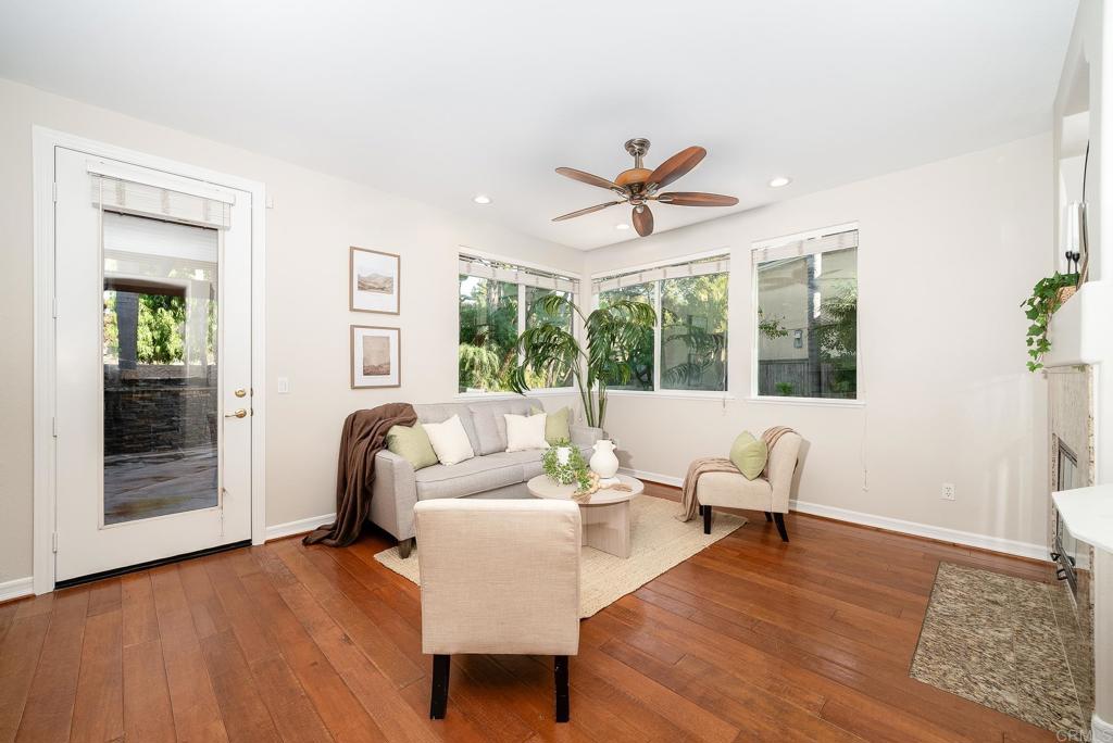 5406 Foxtail Loop Carlsbad, CA 92010 - Photo 11 of 50 a living room with furniture and a large window