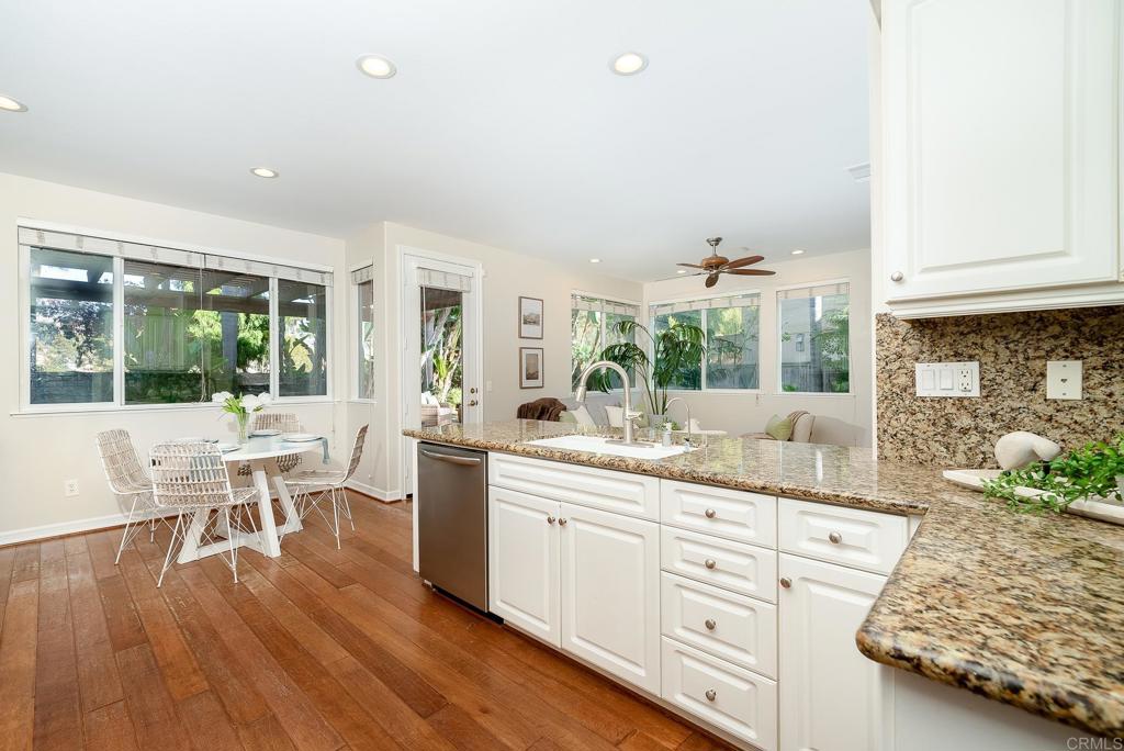 5406 Foxtail Loop Carlsbad, CA 92010 - Photo 15 of 50 a living room with furniture and wooden floor