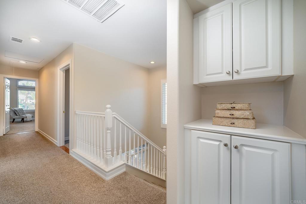 5406 Foxtail Loop Carlsbad, CA 92010 - Photo 20 of 50 a view of a hallway with entryway door