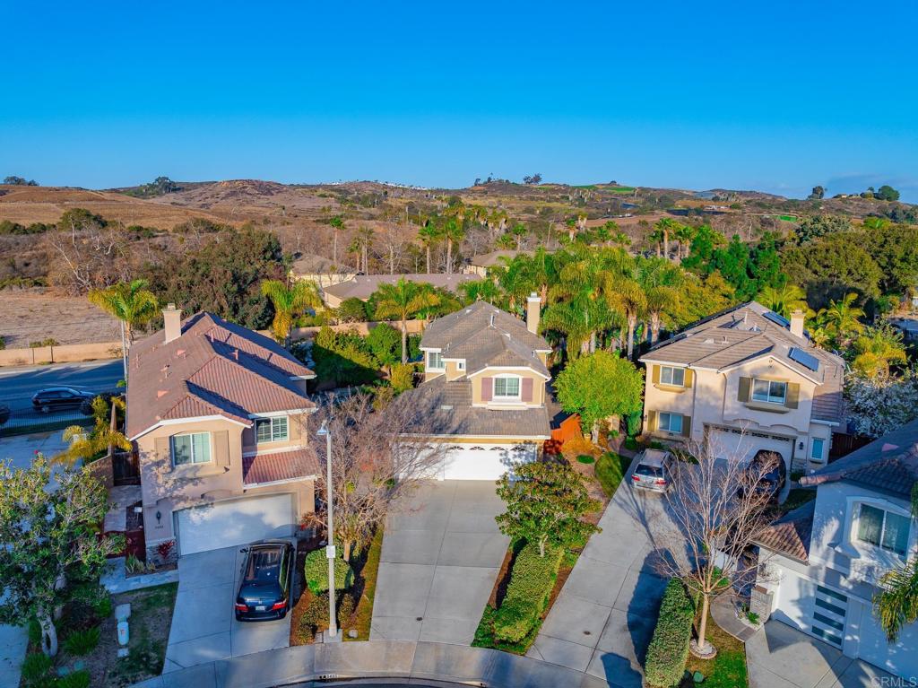 5406 Foxtail Loop Carlsbad, CA 92010 - Photo 2 of 50 an aerial view of residential houses with outdoor space