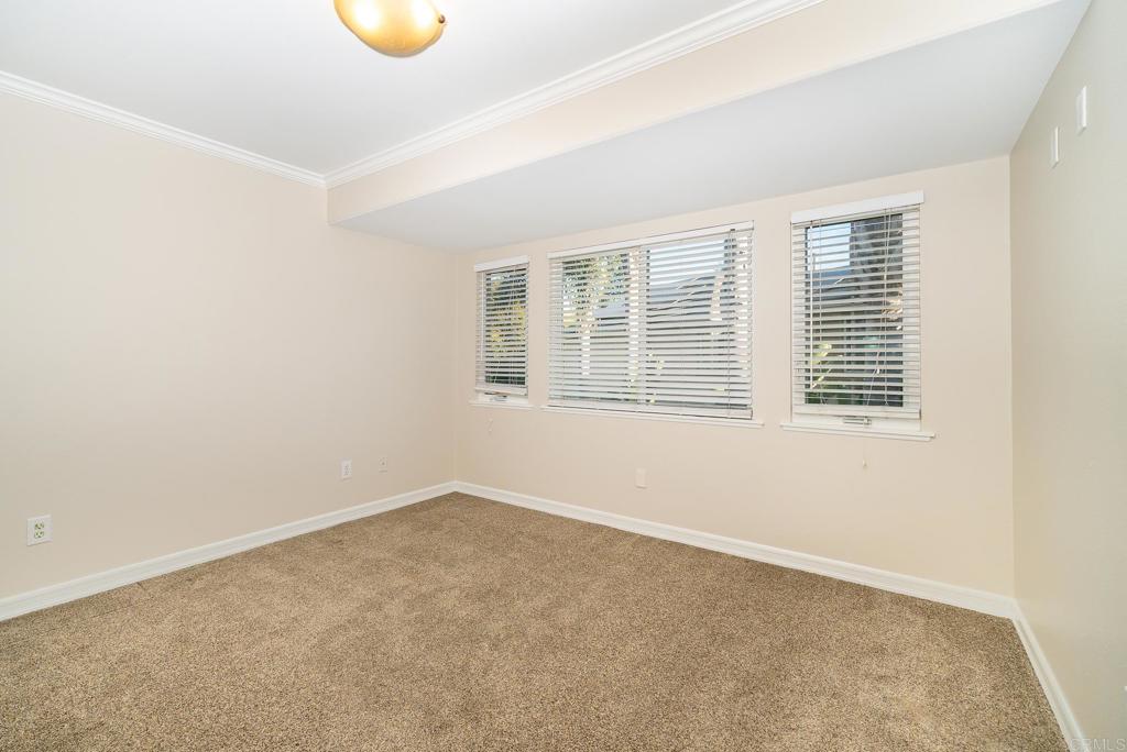 5406 Foxtail Loop Carlsbad, CA 92010 - Photo 29 of 50 an empty room with a window
