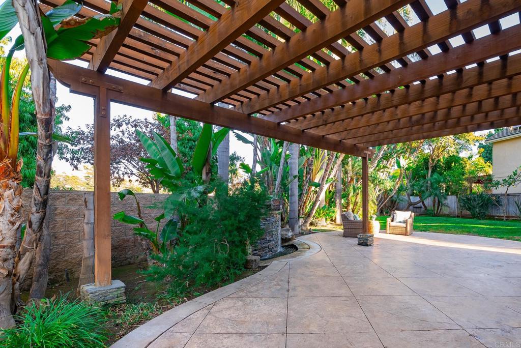 5406 Foxtail Loop Carlsbad, CA 92010 - Photo 37 of 50 a view of yard with porch and garden