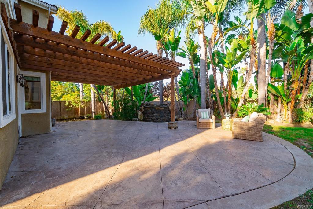 5406 Foxtail Loop Carlsbad, CA 92010 - Photo 39 of 50 a view of a backyard with plants and a patio