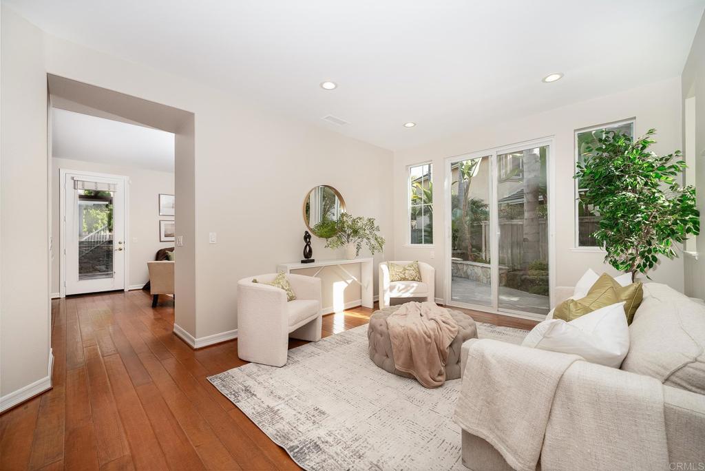 5406 Foxtail Loop Carlsbad, CA 92010 - Photo 7 of 50 a living room with furniture and a large window