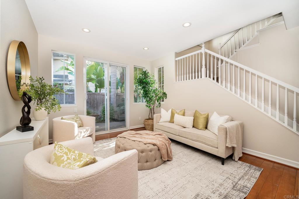 5406 Foxtail Loop Carlsbad, CA 92010 - Photo 8 of 50 a living room with furniture and a large window