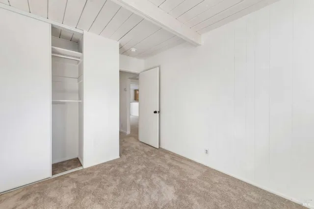 a view of empty room with windows