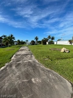 7727 Carpenter Road Bokeelia, FL 33922 - Photo 3 of 4 a view of a field with an outdoor space