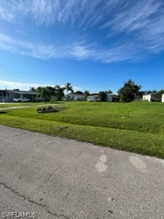 7727 Carpenter Road Bokeelia, FL 33922 - Photo 4 of 4 a view of a field with a grassy area