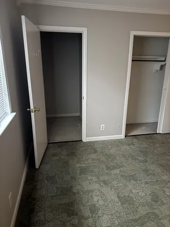 an empty room with a door