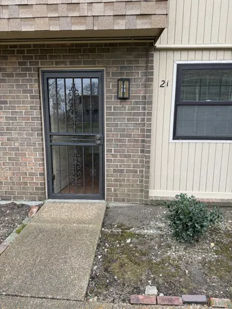 a front view of a house with windows