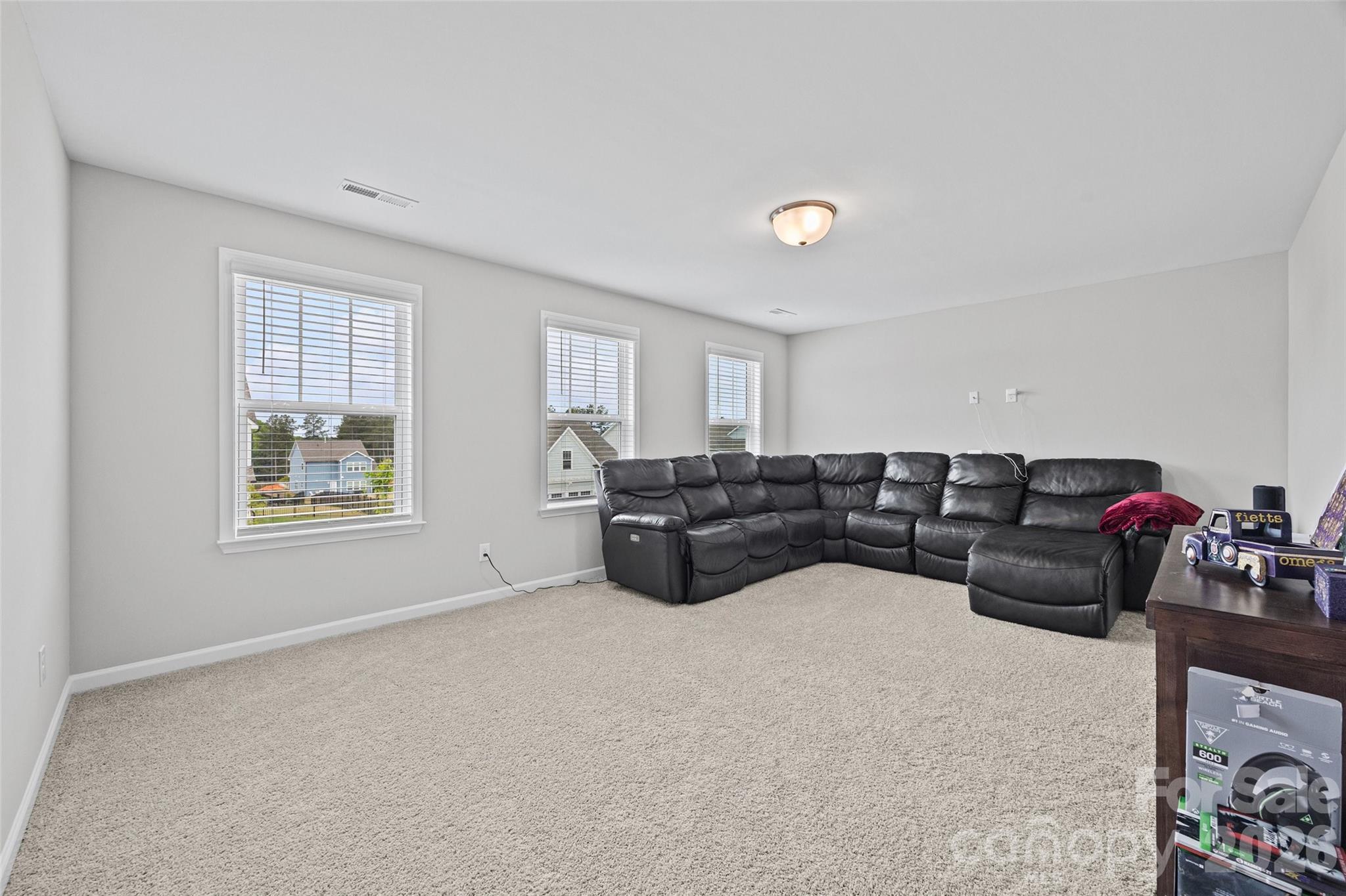 12000 Sam Snead Court Lancaster, SC 29720 - Photo 18 of 36 a living room with furniture and a window