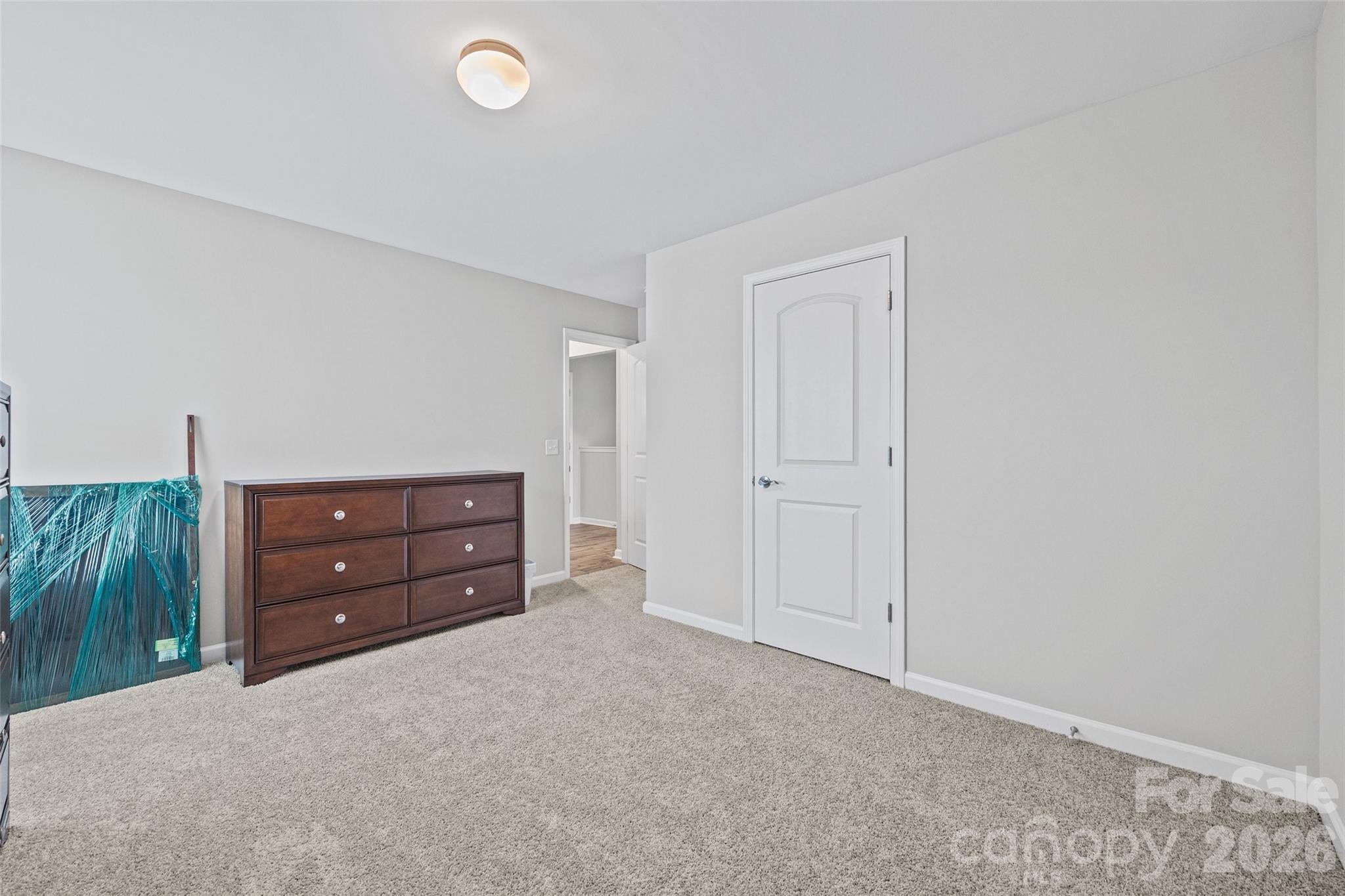 12000 Sam Snead Court Lancaster, SC 29720 - Photo 20 of 36 a room with a bed and a window
