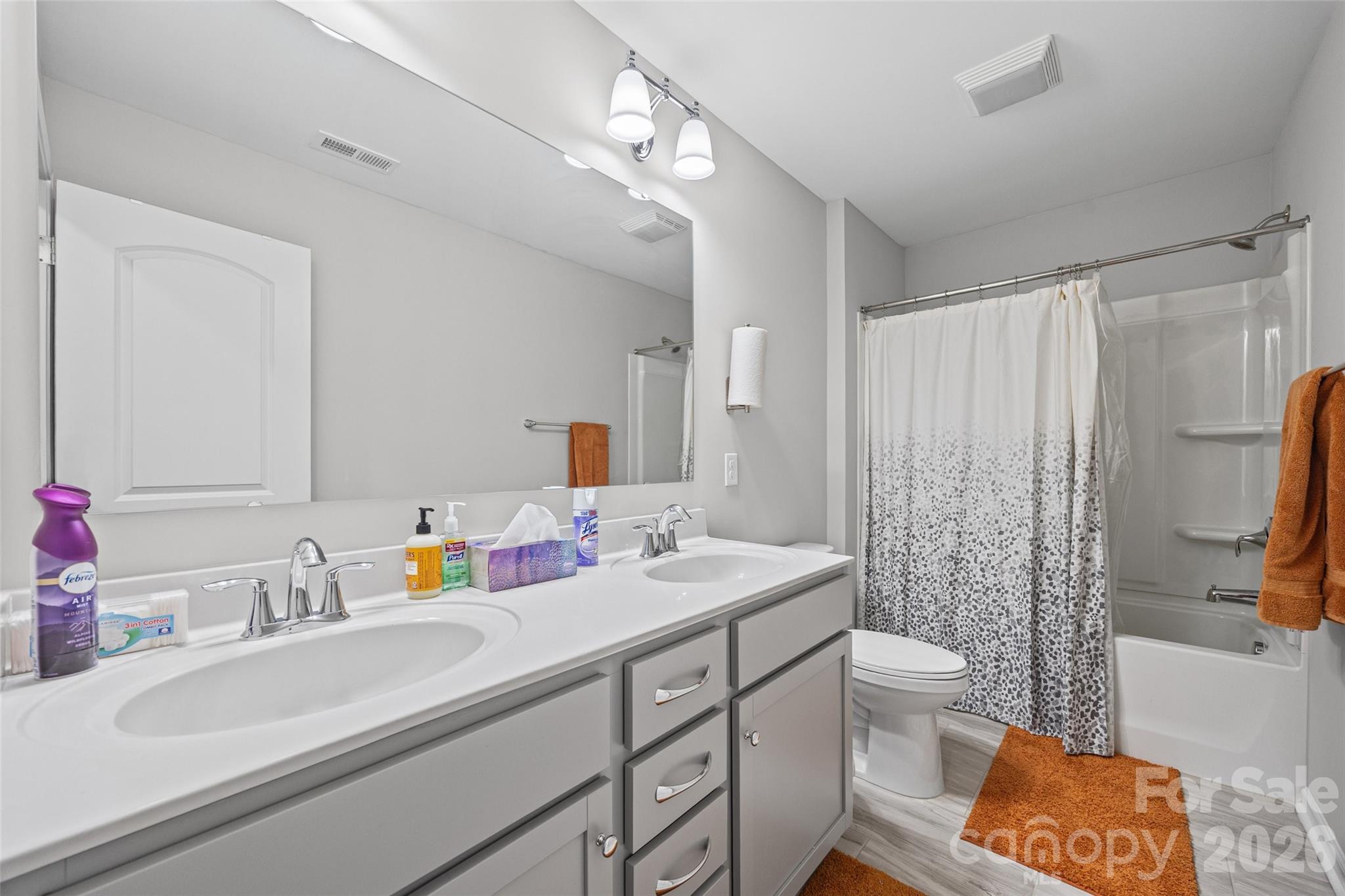 12000 Sam Snead Court Lancaster, SC 29720 - Photo 24 of 36 a bathroom with a sink double vanity and a toilet