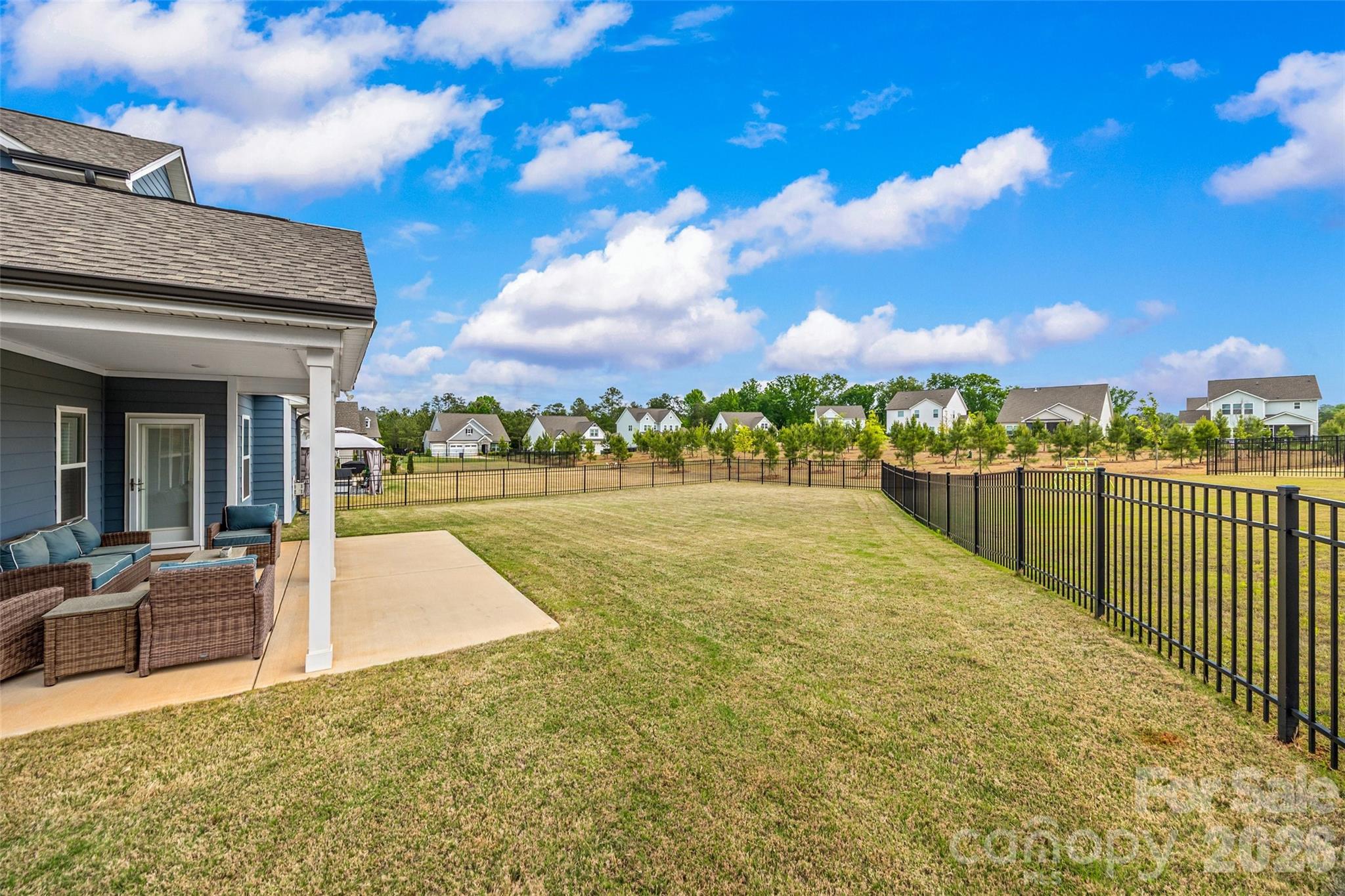 12000 Sam Snead Court Lancaster, SC 29720 - Photo 28 of 36 a view of a swimming pool and a terrace