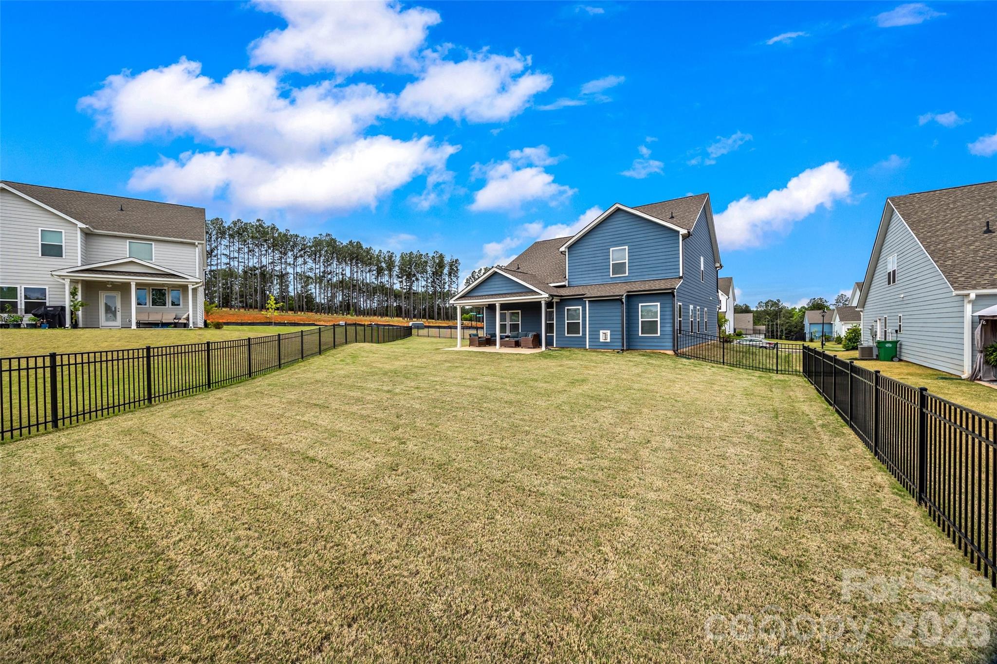 12000 Sam Snead Court Lancaster, SC 29720 - Photo 29 of 36 a view of a house with a swimming pool