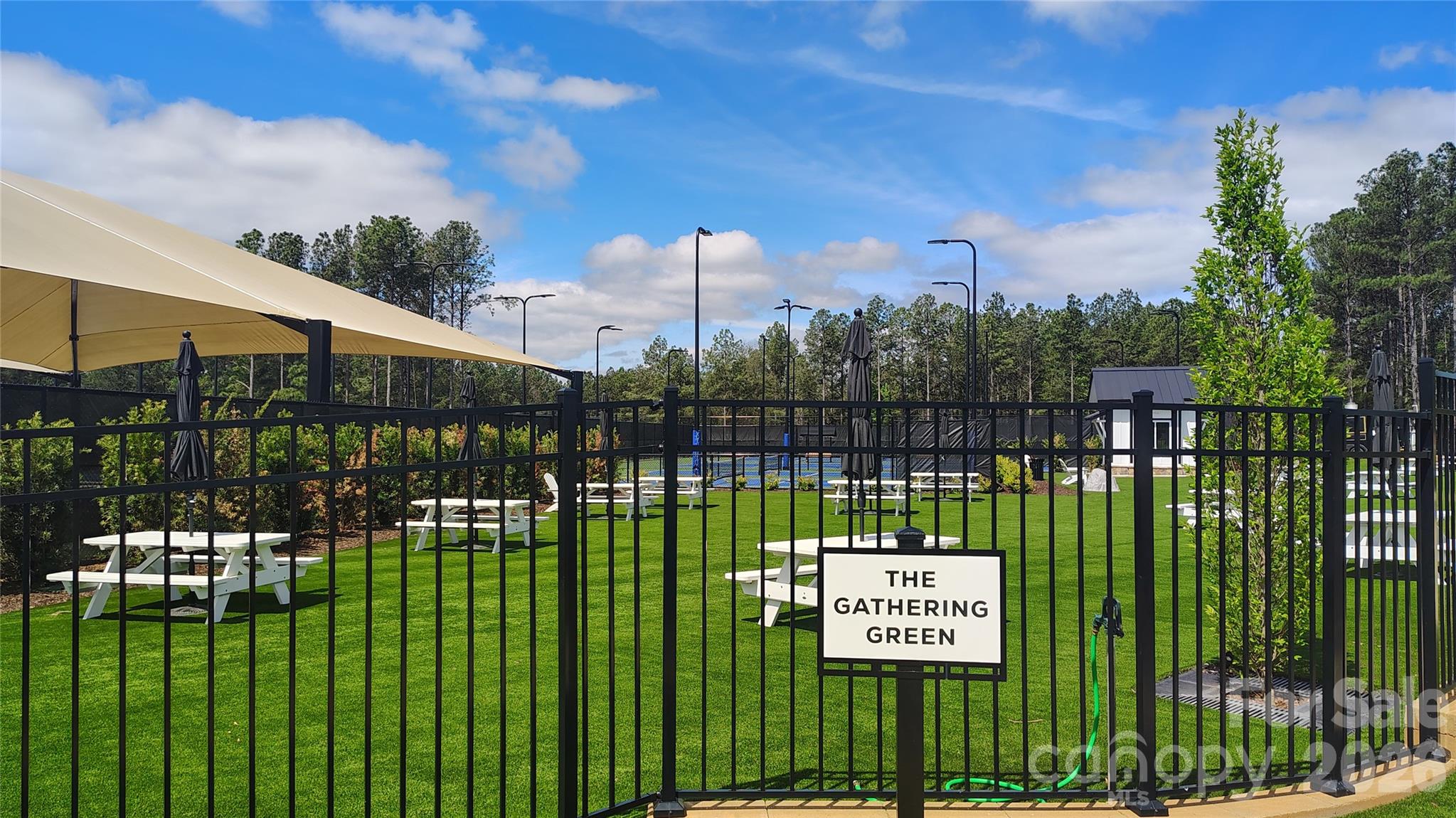 12000 Sam Snead Court Lancaster, SC 29720 - Photo 33 of 36 a view of a building from a garden