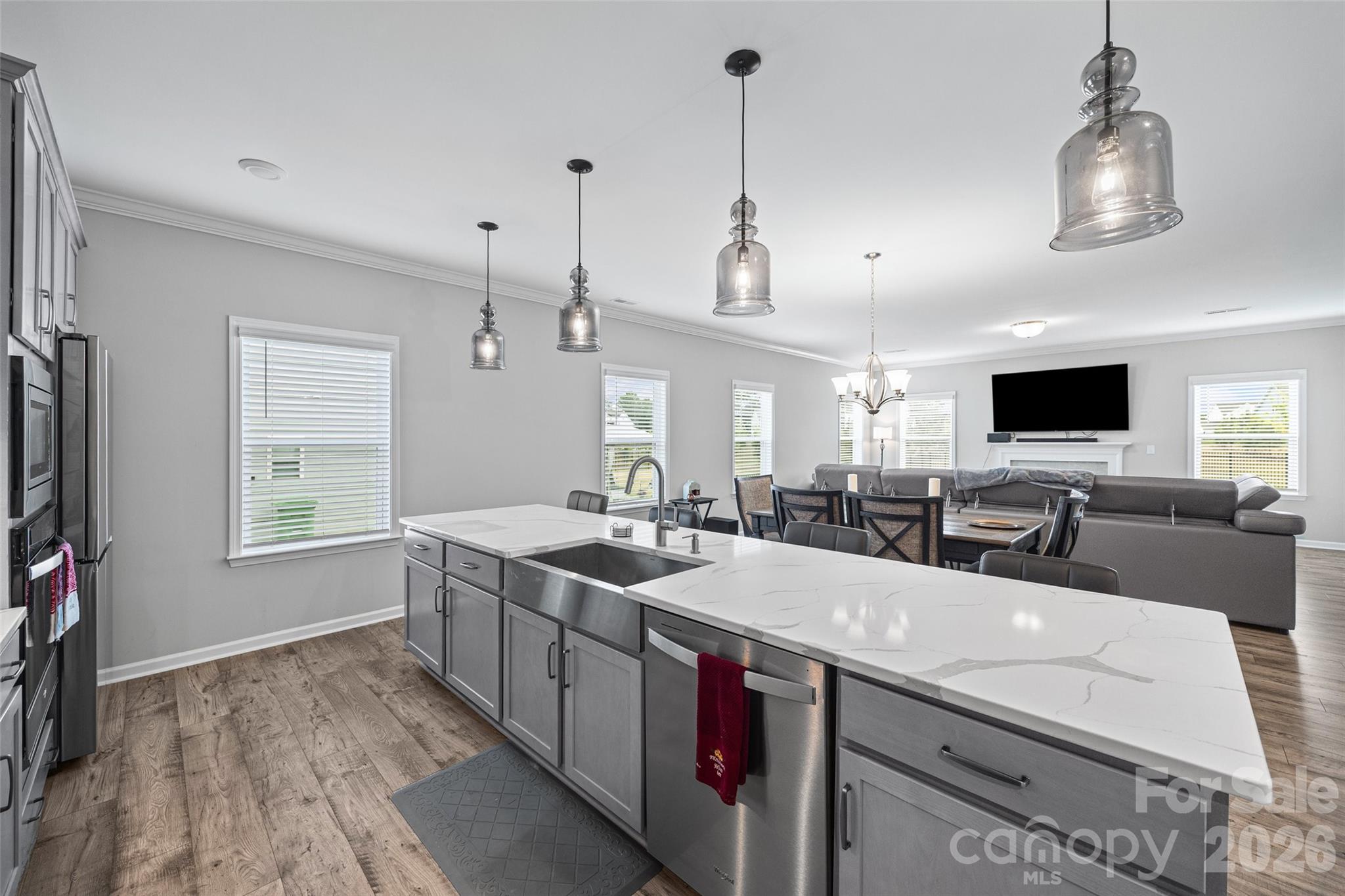 12000 Sam Snead Court Lancaster, SC 29720 - Photo 6 of 36 a kitchen with stainless steel appliances granite countertop a sink and a stove