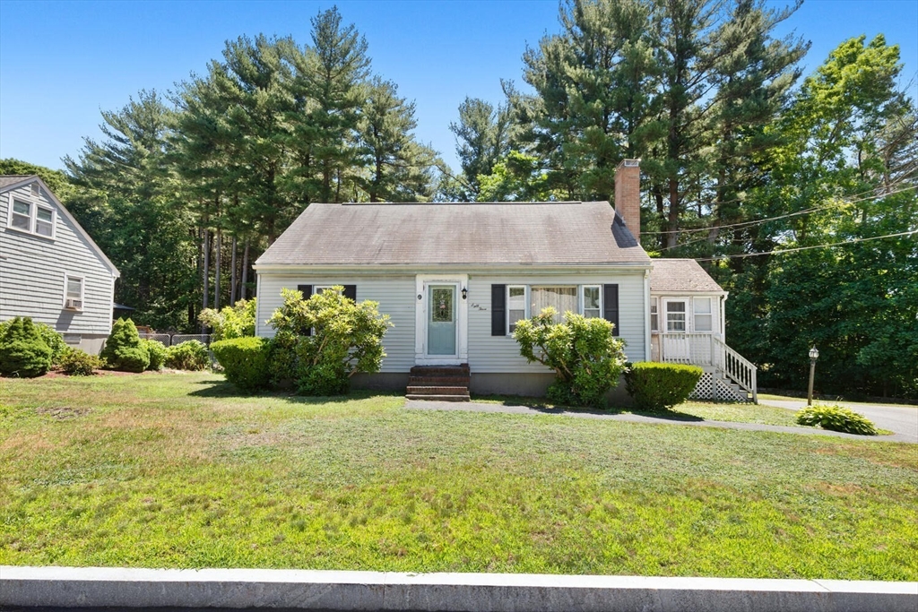 63 Baldwin Road Billerica, MA 01821 - Photo 1 of 38 a view of a house with a yard and potted plants