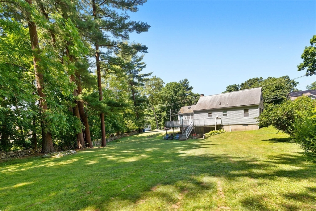 63 Baldwin Road Billerica, MA 01821 - Photo 33 of 38 a view of a house with a big yard