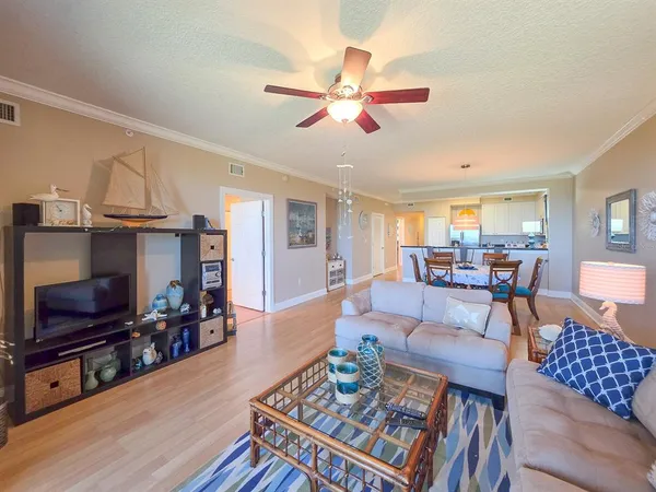 a kitchen with granite countertop a sink and cabinets