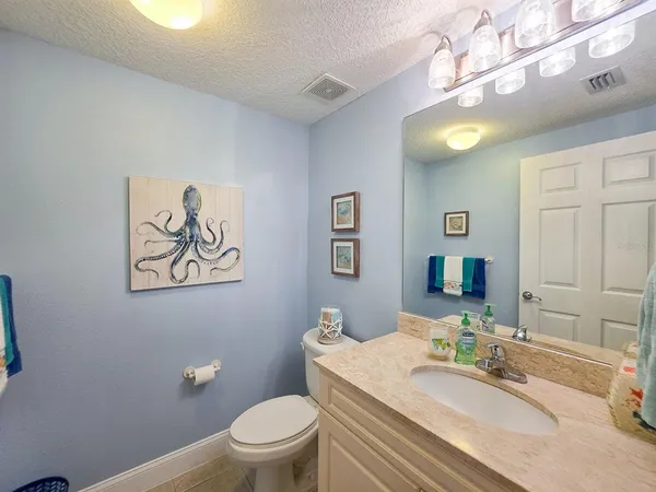 a bathroom with a shower and a sink