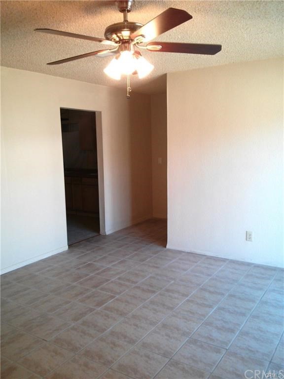 632 North Birch Avenue Rialto, CA 92376 - Photo 19 of 24 a view of an empty room with a ceiling fan