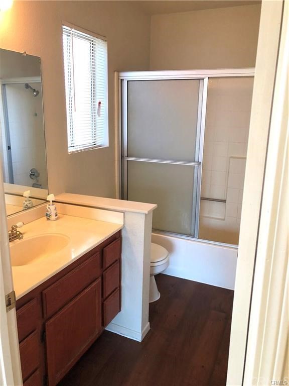 632 North Birch Avenue Rialto, CA 92376 - Photo 10 of 24 a bathroom with a sink a toilet and shower