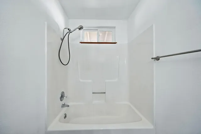 a bathroom with a bathtub