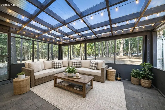 a living room with furniture and garden