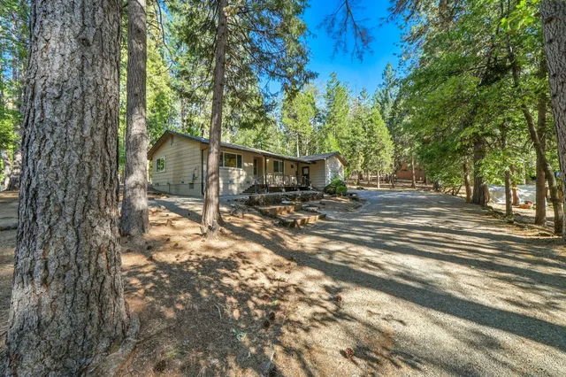 a backyard of a house with lots of green space