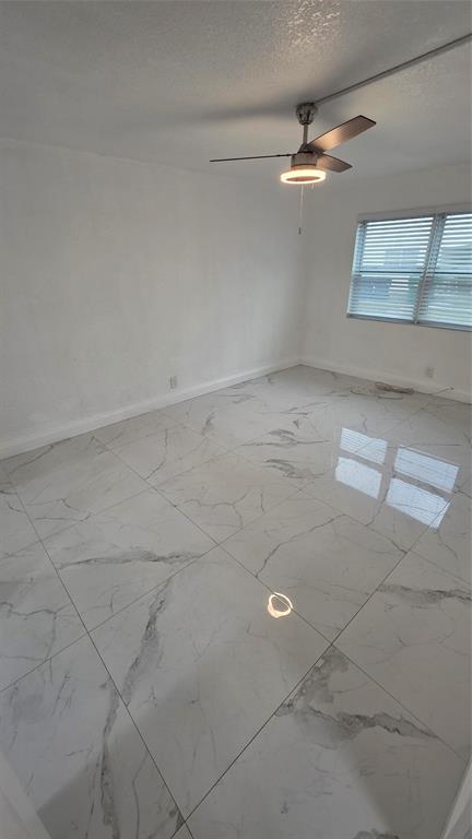 5332 Northwest 18th Street, Unit 2A Lauderhill, FL 33313 - Photo 11 of 13 a view of a livingroom with a window