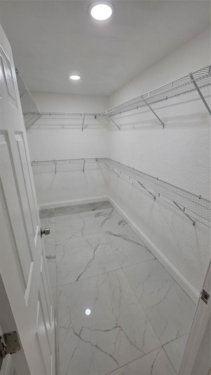 5332 Northwest 18th Street, Unit 2A Lauderhill, FL 33313 - Photo 13 of 13 a view of a room with racks on the wall