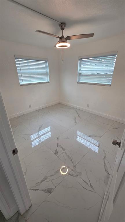 5332 Northwest 18th Street, Unit 2A Lauderhill, FL 33313 - Photo 8 of 13 a view of a livingroom with window