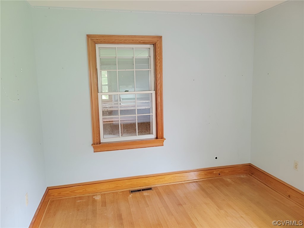 2631 White Chapel Road Lancaster, VA 22503 - Photo 11 of 19 a view of an empty room with a window
