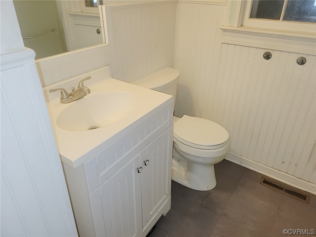 2631 White Chapel Road Lancaster, VA 22503 - Photo 13 of 19 a bathroom with a sink and a toilet