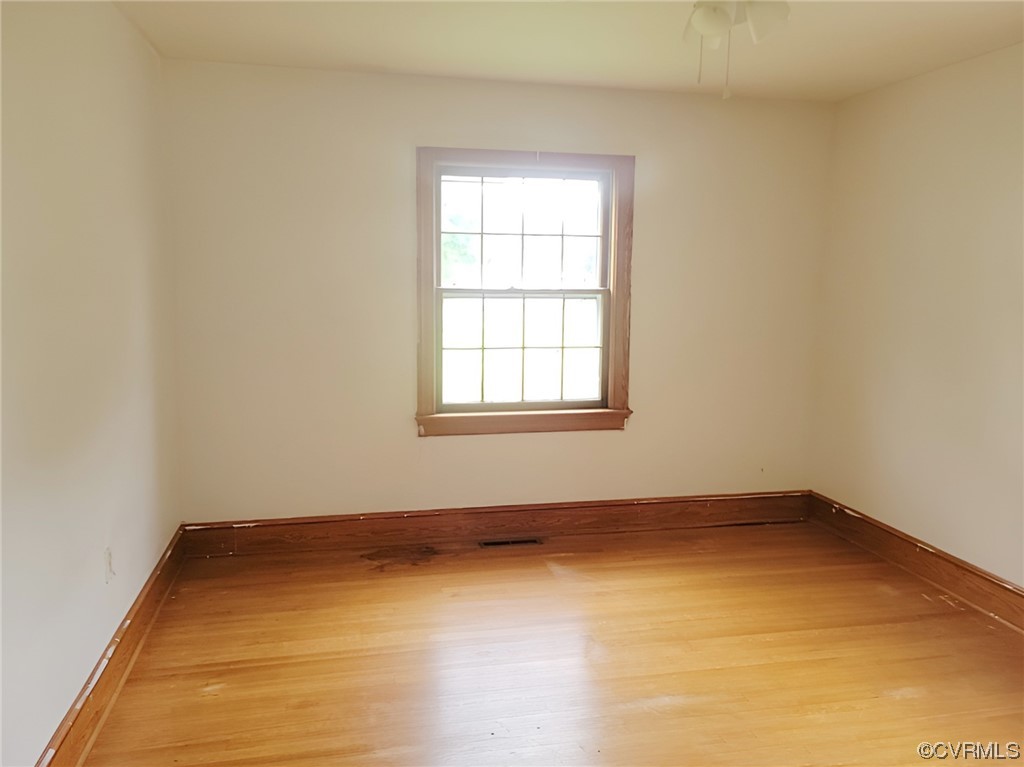 2631 White Chapel Road Lancaster, VA 22503 - Photo 15 of 19 an empty room with a window