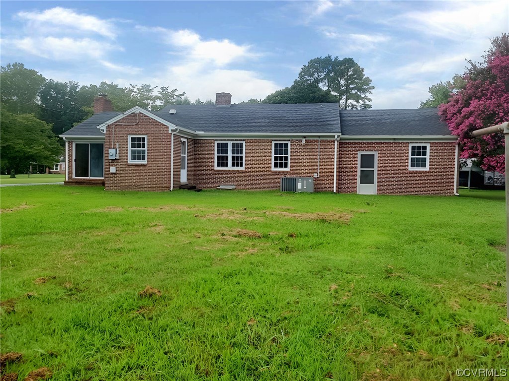 2631 White Chapel Road Lancaster, VA 22503 - Photo 19 of 19 a front of a house with a yard
