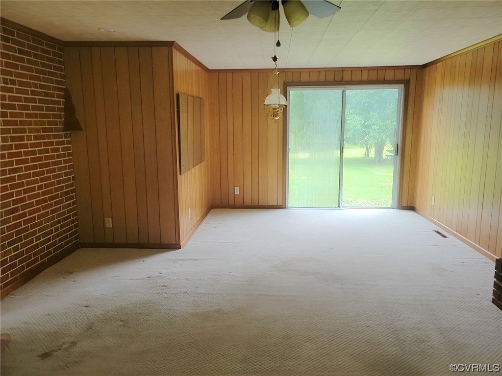 2631 White Chapel Road Lancaster, VA 22503 - Photo 4 of 19 a view of an empty room with a window
