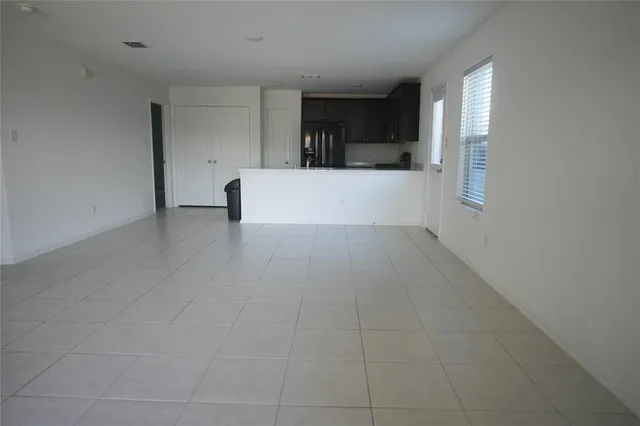 a view of a kitchen with a sink