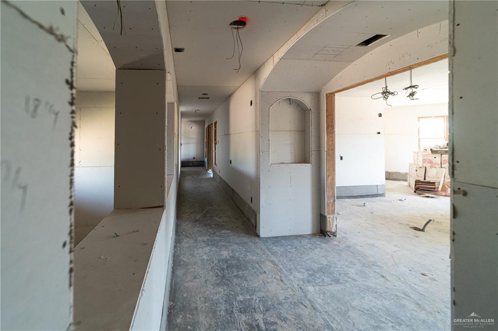 2136 East Mile 3 Road Palmhurst, TX 78573 - Photo 12 of 18 a view of a big room with closet and windows