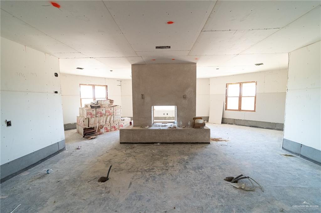 2136 East Mile 3 Road Palmhurst, TX 78573 - Photo 14 of 18 a living room with furniture and a window