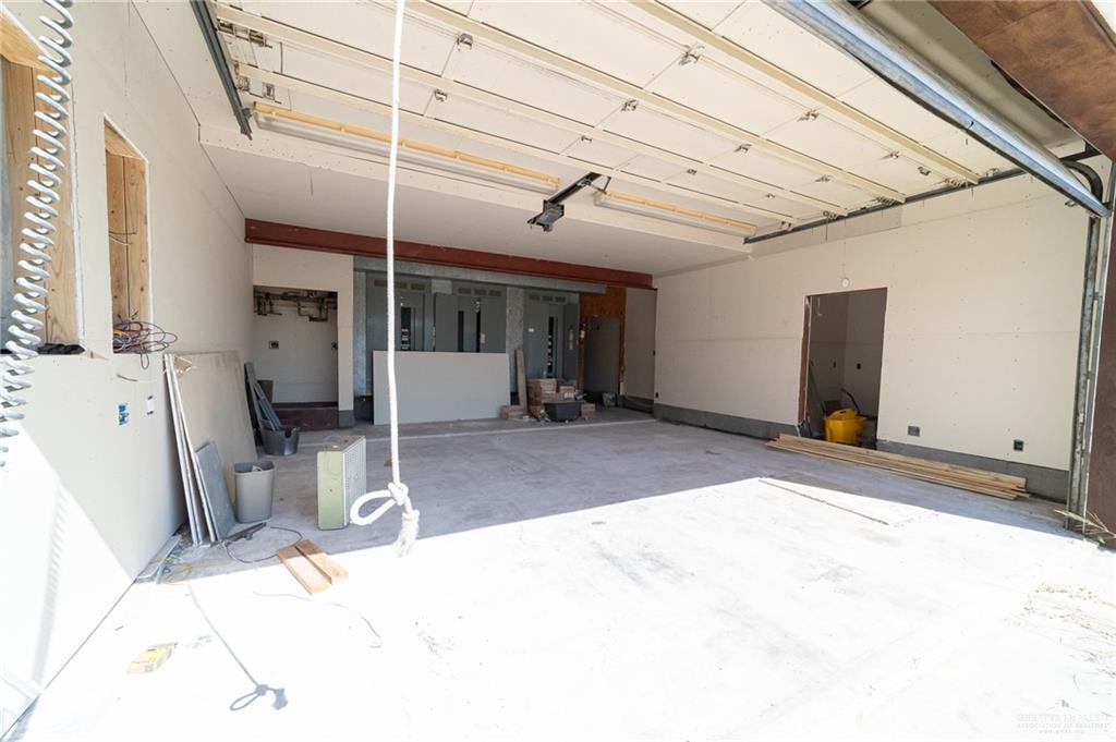 2136 East Mile 3 Road Palmhurst, TX 78573 - Photo 17 of 18 a bedroom with furniture and a window