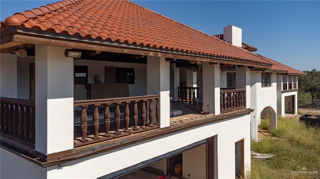 2136 East Mile 3 Road Palmhurst, TX 78573 - Photo 4 of 18 a view of a house with street