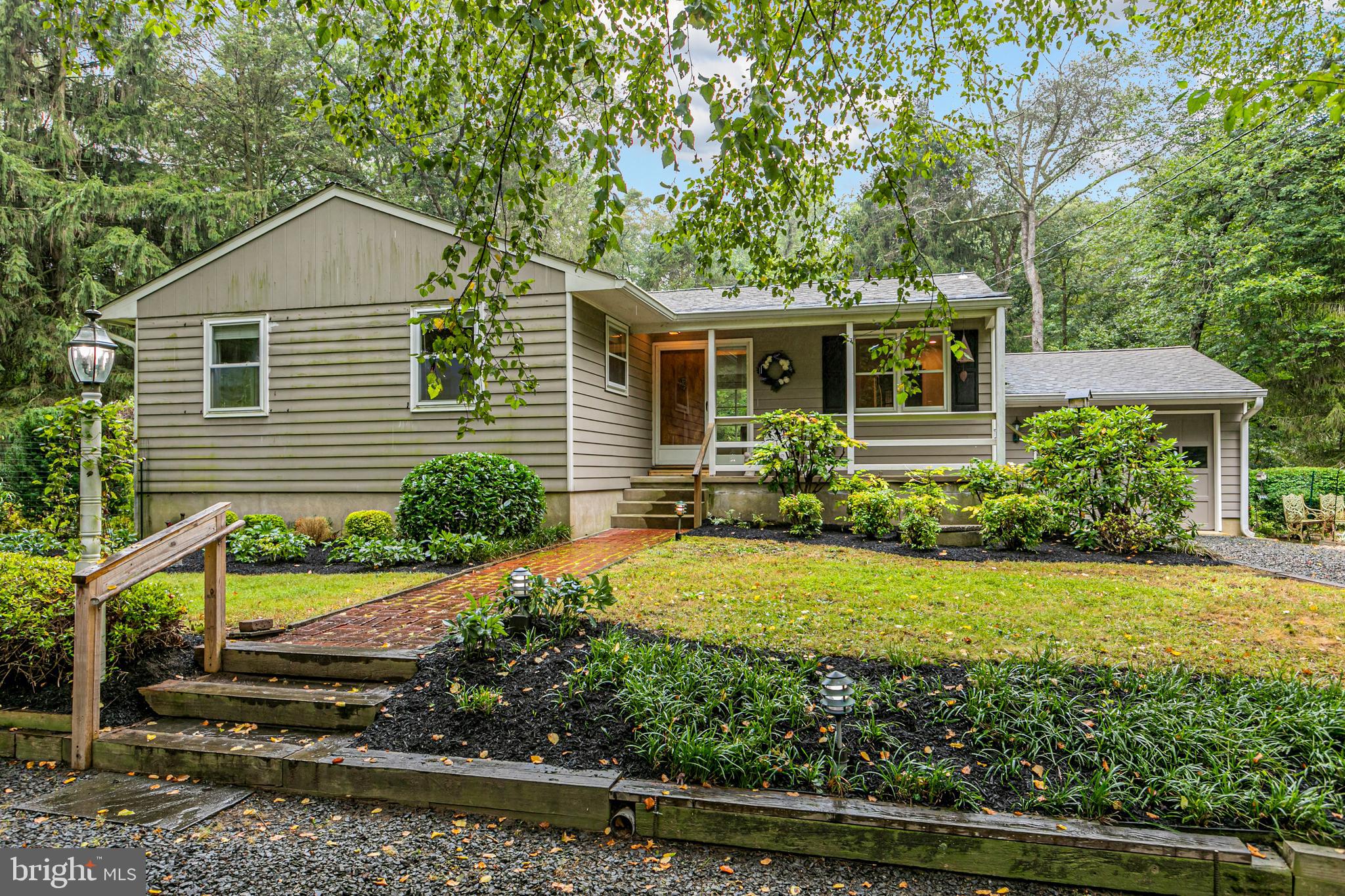 63 North Mill Road Princeton Junction, NJ 08550 - Photo 1 of 29 a front view of a house with garden